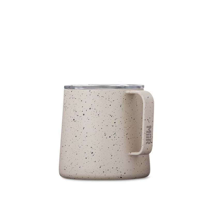 grounded-camp-cup-y0 Web_PDP-12oz_Grounded_Camp_Cup_Desert_Tan_Speckle_Studio_GCUSL1SV12224__Front_1.jpg
